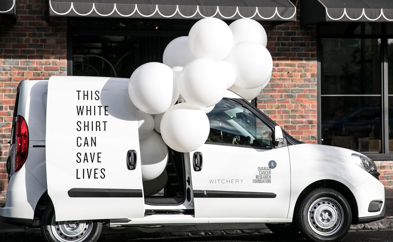 white van white balloons
